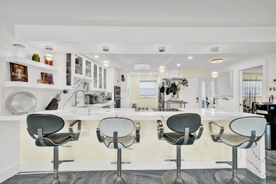 One of the finest three-bedroom waterfront residences in - photo 10