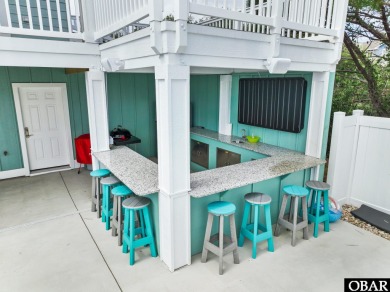 Welcome to 913 Whalehead Drive, a beautifully maintained