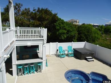 Welcome to 913 Whalehead Drive, a beautifully maintained