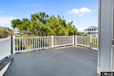 Welcome to 913 Whalehead Drive, a beautifully maintained