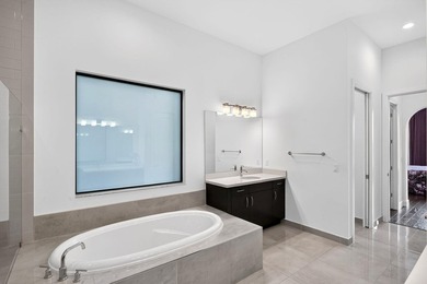 Welcome to luxury living in the prestigious, gated enclave of - photo 15