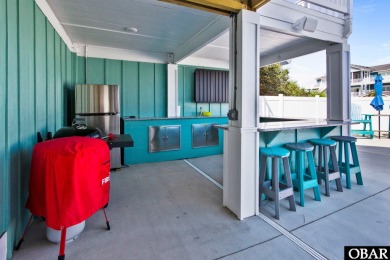 Welcome to 913 Whalehead Drive, a beautifully maintained