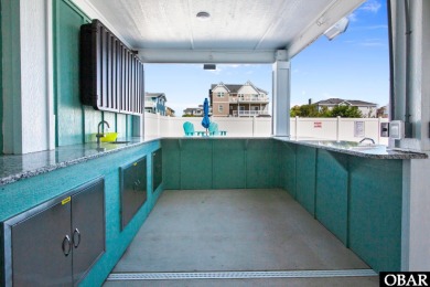 Welcome to 913 Whalehead Drive, a beautifully maintained