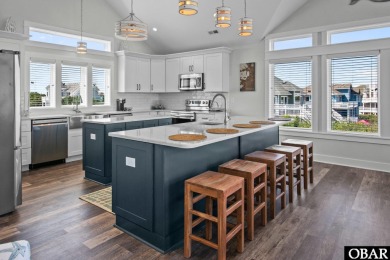 Welcome to 913 Whalehead Drive, a beautifully maintained