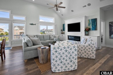 Welcome to 913 Whalehead Drive, a beautifully maintained