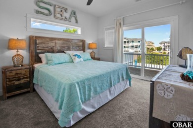 Welcome to 913 Whalehead Drive, a beautifully maintained