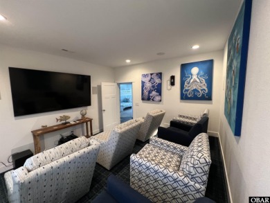 Welcome to 913 Whalehead Drive, a beautifully maintained