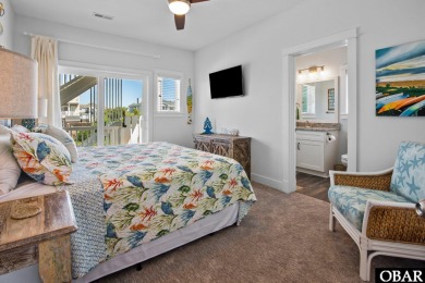 Welcome to 913 Whalehead Drive, a beautifully maintained