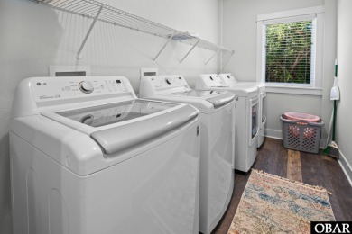 Welcome to 913 Whalehead Drive, a beautifully maintained