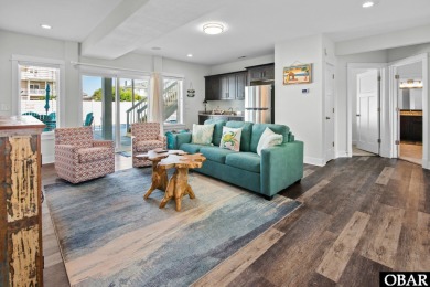 Welcome to 913 Whalehead Drive, a beautifully maintained