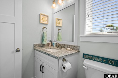 Welcome to 913 Whalehead Drive, a beautifully maintained