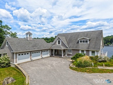 Experience the ultimate lakefront lifestyle at this