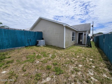 Half a mile from the sand and priced to catch your eye -- this - photo 10