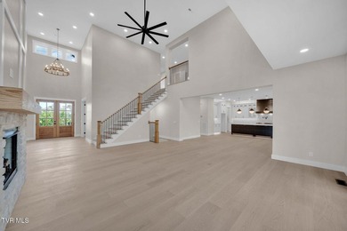 This exquisite gem nestled in the prestigious Ridges subdivision