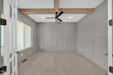 This exquisite gem nestled in the prestigious Ridges subdivision