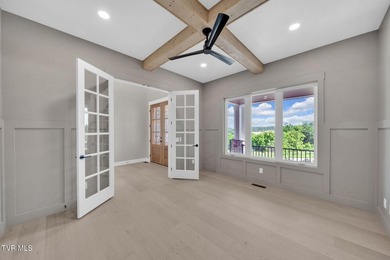 This exquisite gem nestled in the prestigious Ridges subdivision