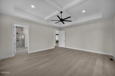 This exquisite gem nestled in the prestigious Ridges subdivision