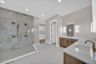 This exquisite gem nestled in the prestigious Ridges subdivision