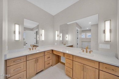 This exquisite gem nestled in the prestigious Ridges subdivision