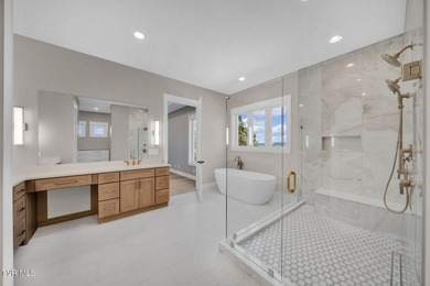 This exquisite gem nestled in the prestigious Ridges subdivision