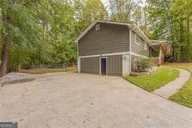 Nestled on a level lot just over half an acre, this beautifully - photo 5