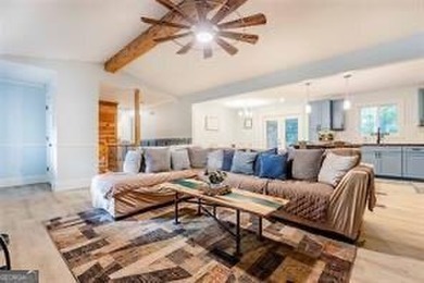 Nestled on a level lot just over half an acre, this beautifully - photo 10