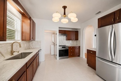 A thoughtfully preserved historic home with its original - photo 13
