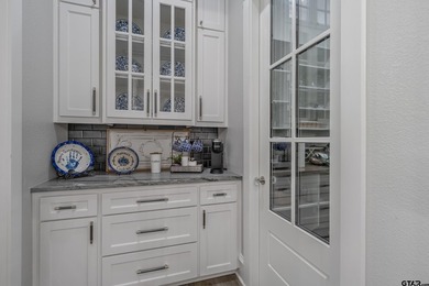 Nestled behind the secure gates of Tyler's premier acreage - photo 20