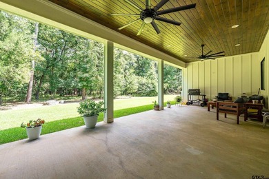 Nestled behind the secure gates of Tyler's premier acreage - photo 38