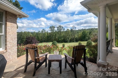 This stunning home overlooks the 17th green at Cleghorn Golf - photo 2