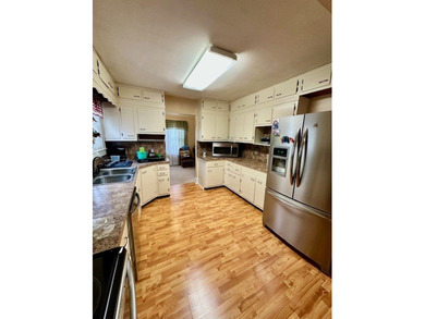 This inviting 3 bedroom 2 bath home is full of charm and