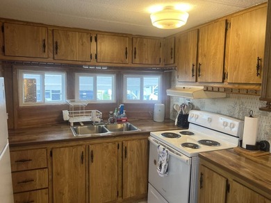 This 2 Bedroom, 1 Bath Fully Furnished Home is located in - photo 18