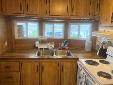 This 2 Bedroom, 1 Bath Fully Furnished Home is located in - photo 19