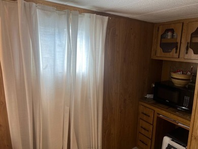 This 2 Bedroom, 1 Bath Fully Furnished Home is located in - photo 21