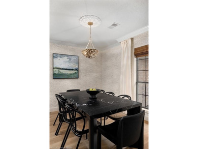Stunningly renovated in 2024, this 4-bedroom, 3 full bath and 1 - photo 12