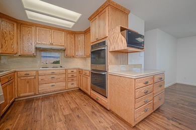 Canal front property with boat launch. This two-story, two-lot