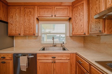 Canal front property with boat launch. This two-story, two-lot