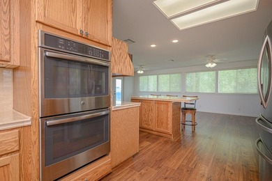 Canal front property with boat launch. This two-story, two-lot