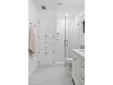 Stunningly renovated in 2024, this 4-bedroom, 3 full bath and 1 - photo 17