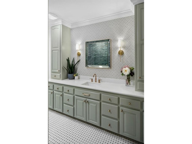 Stunningly renovated in 2024, this 4-bedroom, 3 full bath and 1 - photo 20