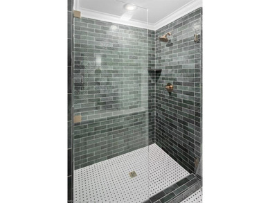 Stunningly renovated in 2024, this 4-bedroom, 3 full bath and 1 - photo 21