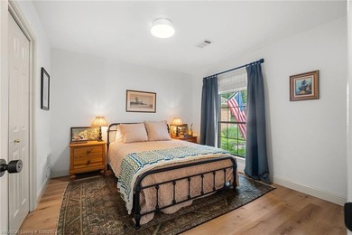 Stunningly renovated in 2024, this 4-bedroom, 3 full bath and 1 - photo 22