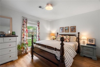 Stunningly renovated in 2024, this 4-bedroom, 3 full bath and 1 - photo 23