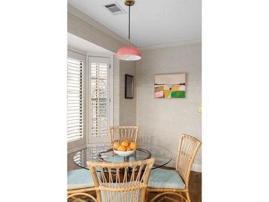 Stunningly renovated in 2024, this 4-bedroom, 3 full bath and 1 - photo 28
