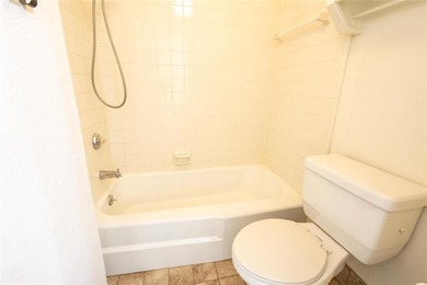 Welcome to this spacious 2-bedroom, 2-bath condominium located