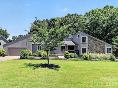 Beautiful mid-century modern nestled on the golf course in the - photo 1