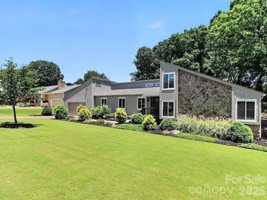 Beautiful mid-century modern nestled on the golf course in the - photo 4