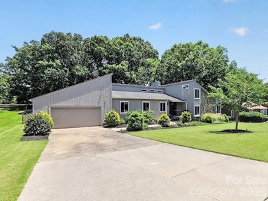 Beautiful mid-century modern nestled on the golf course in the - photo 5
