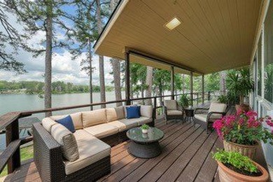 Sitting on the water in Hideaway Lake, this spacious 4-bedroom - photo 3