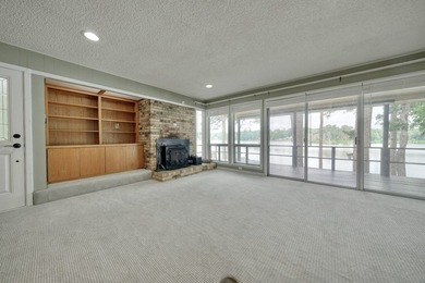 Sitting on the water in Hideaway Lake, this spacious 4-bedroom - photo 9